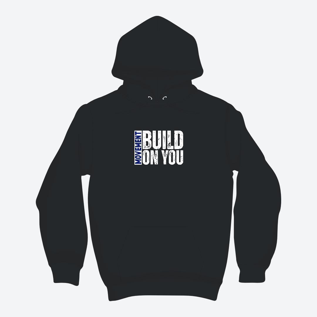 Black hoodie with text 'MY HEART BUILD ON YOU' on a light gray background