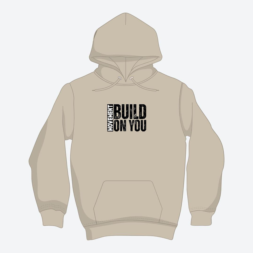 Beige hoodie with text 'MY HEART BUILD ON YOU' on a white background