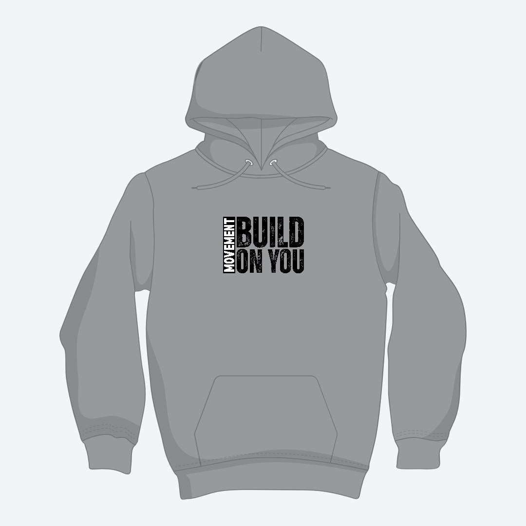 Gray hoodie with 'MY MOVEMENT BUILD ON YOU' text on a light gray background